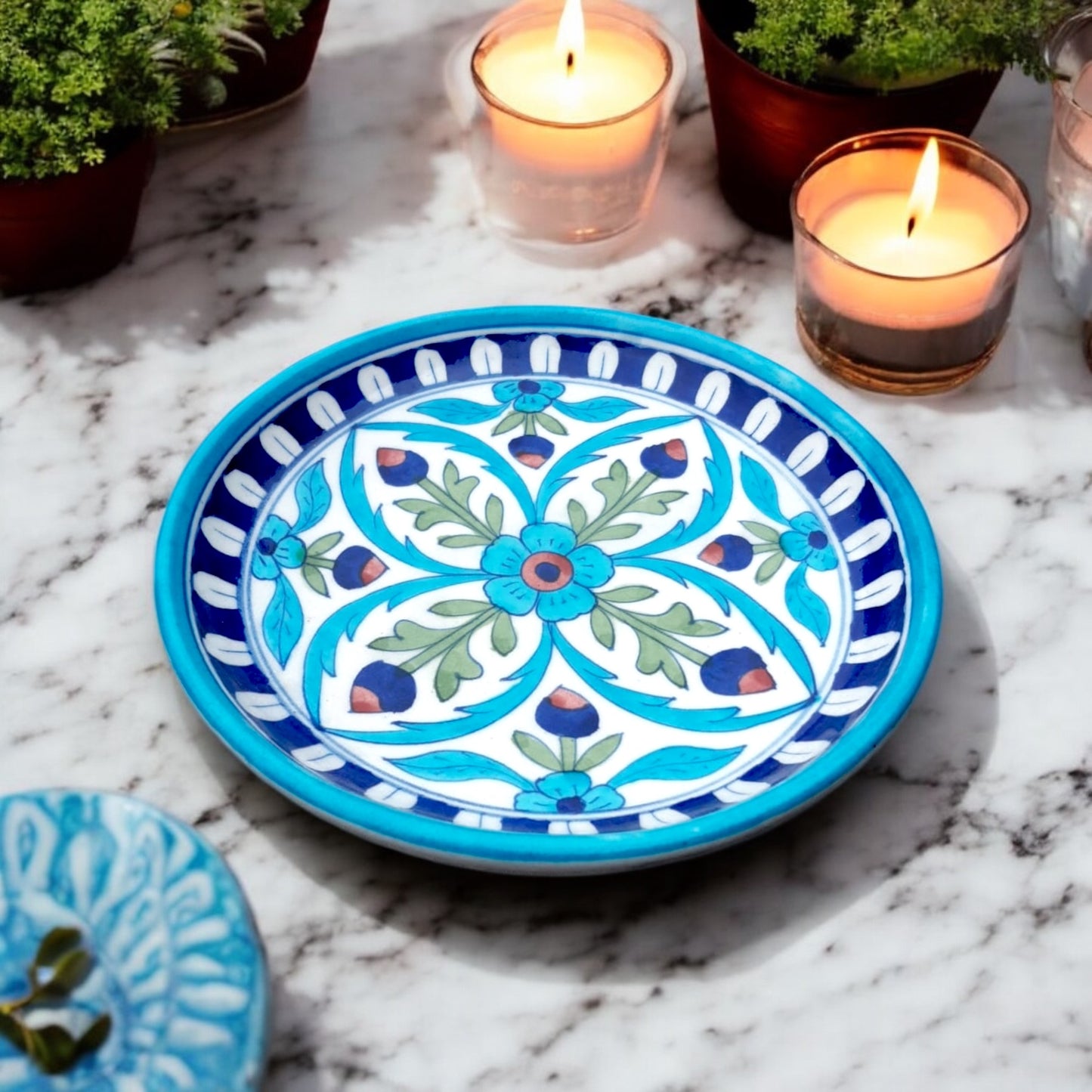 Introducing our exquisite hand painted plate, a timeless piece of functional art that seamlessly blends tradition with contemporary elegance. This stunning plate is meticulously crafted by skilled artisans from Jaipur, India. 