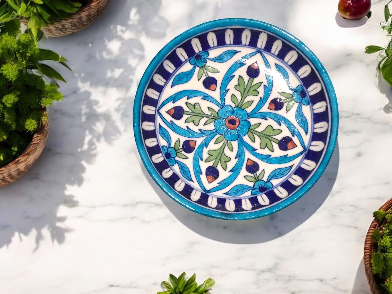 Introducing our exquisite hand painted plate, a timeless piece of functional art that seamlessly blends tradition with contemporary elegance. This stunning plate is meticulously crafted by skilled artisans from Jaipur, India.