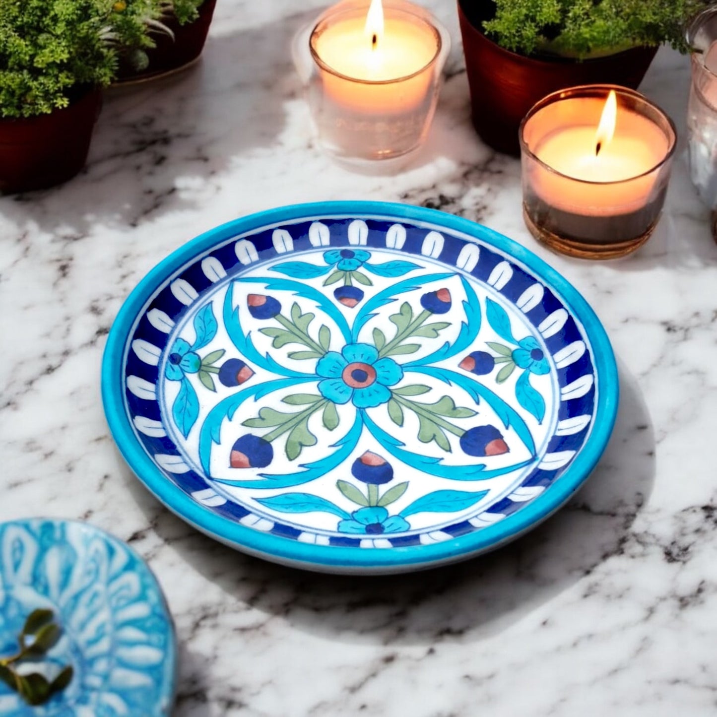 Introducing our exquisite hand painted plate, a timeless piece of functional art that seamlessly blends tradition with contemporary elegance. This stunning plate is meticulously crafted by skilled artisans from Jaipur, India.&nbsp;&nbsp;